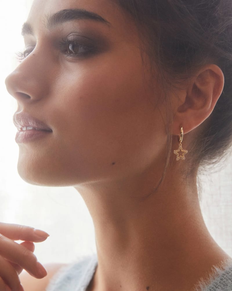 Jae Star Gold Huggie Earrings in White Crystal image number 1